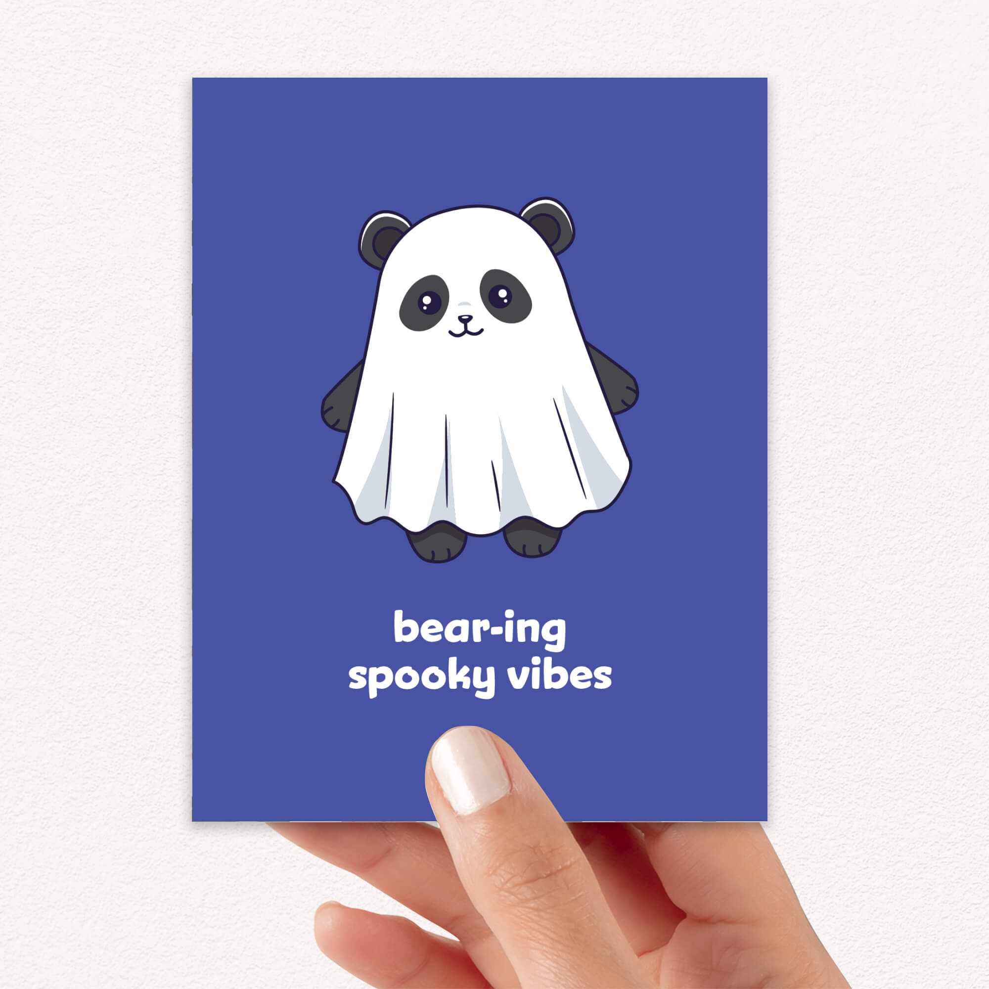 kawaii halloween Greeting card with a panda bear ghost illustration and text on a blue background