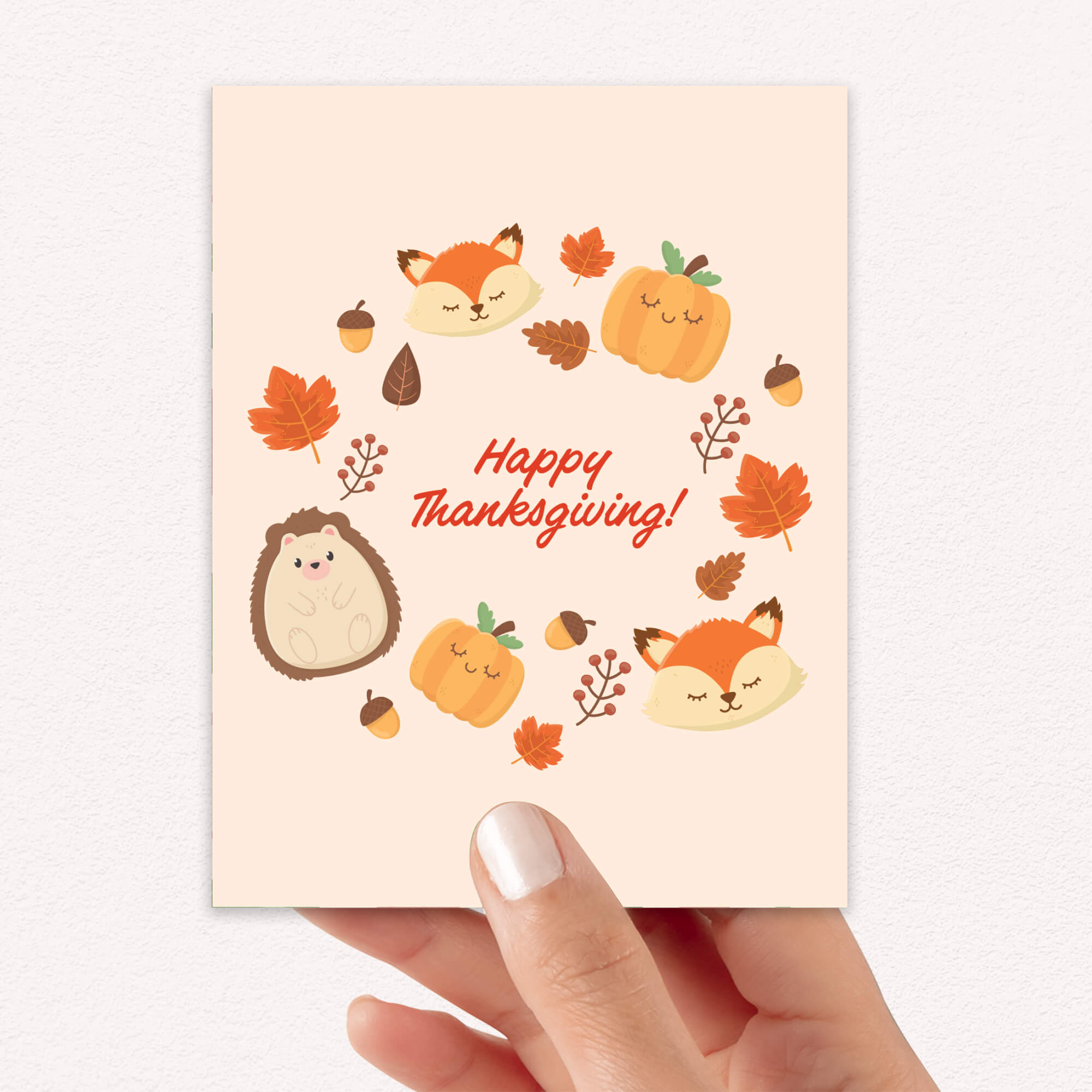 fall Card with autumn-themed illustrations and 'Happy Thanksgiving!' text held by a hand.