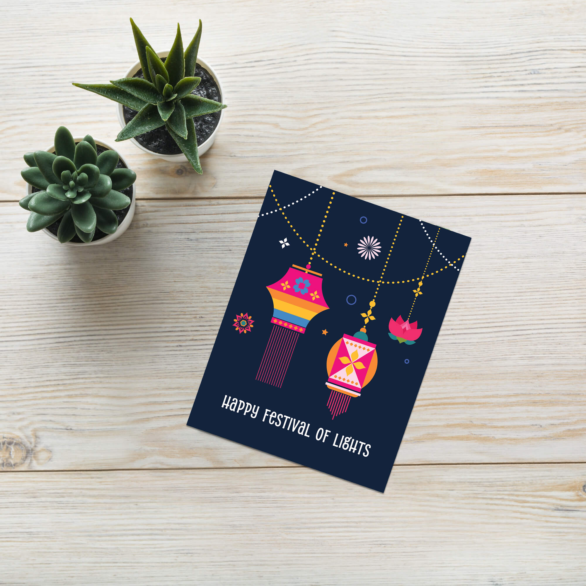 indian hindu Greeting card with colorful lanterns and 'Happy Festival of Lights' text on a dark blue background.