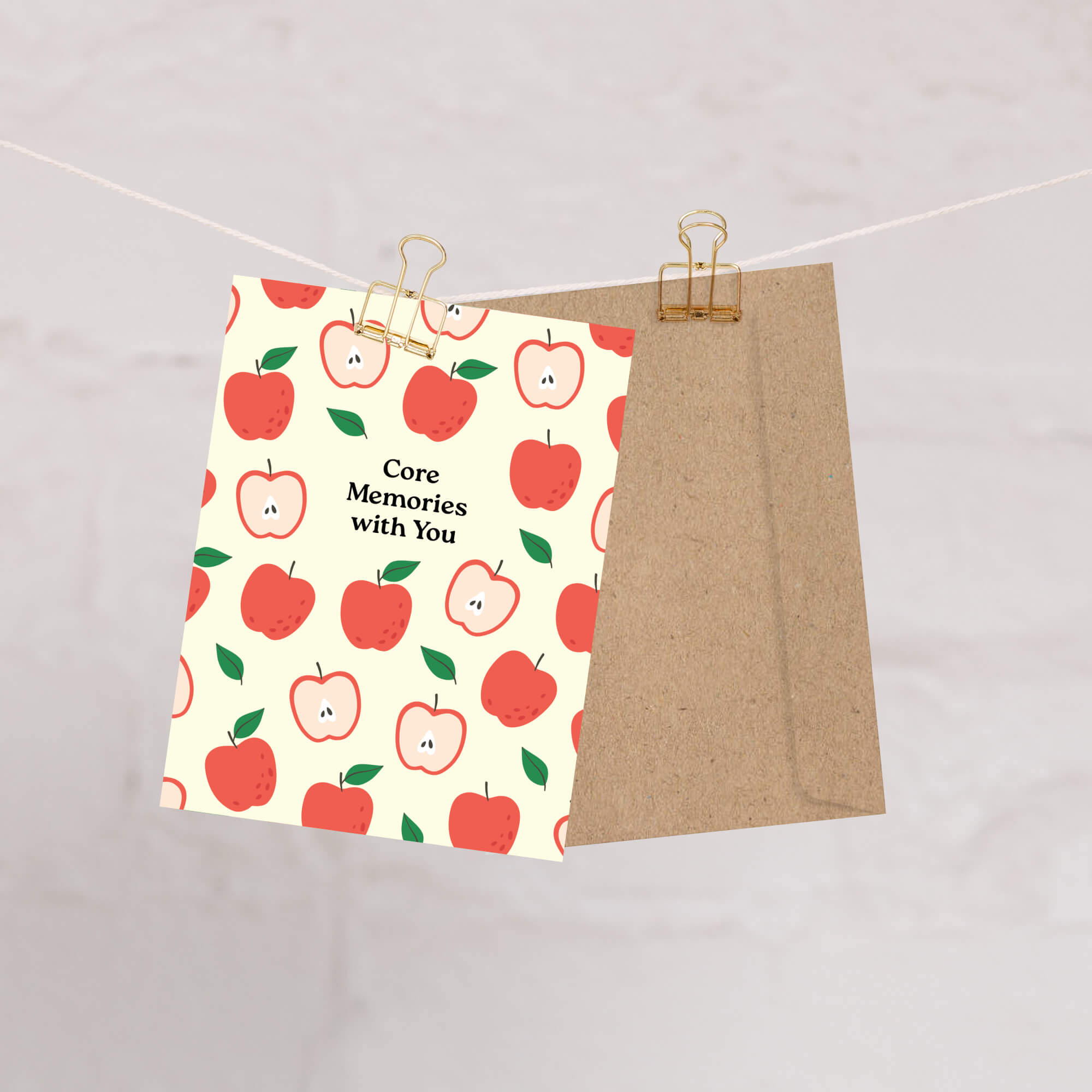 asian Greeting card with red apples pattern and 'Core Memories with You' text on a beige background
