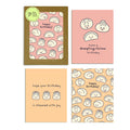 boxed birthday cards of Four cute dumpling-themed birthday cards on a white background