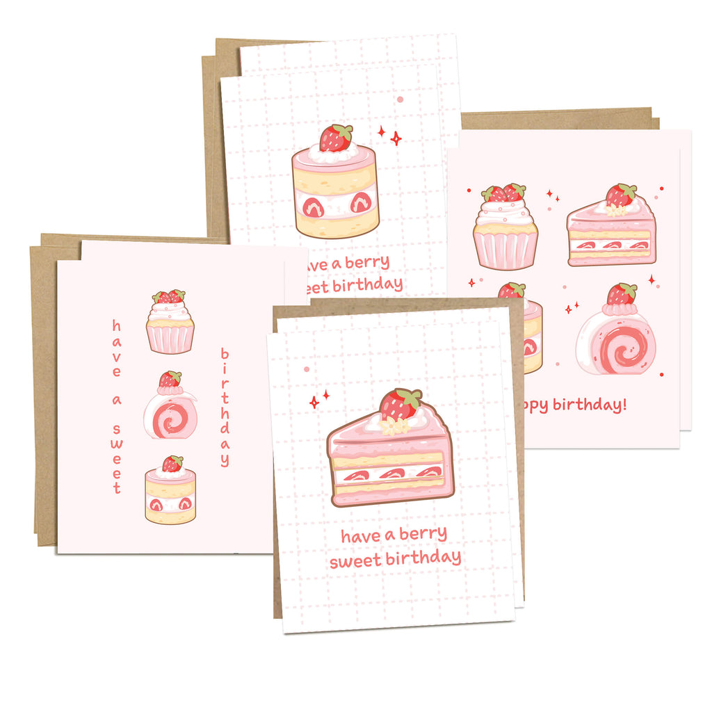 boxed Set of birthday cards with cake illustrations and text on a white background