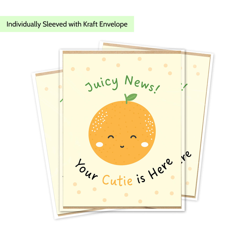 A stack of cute baby shower cards featuring a smiling orange illustration with the text 'Juicy News!' and 'Your Cutie is Here.