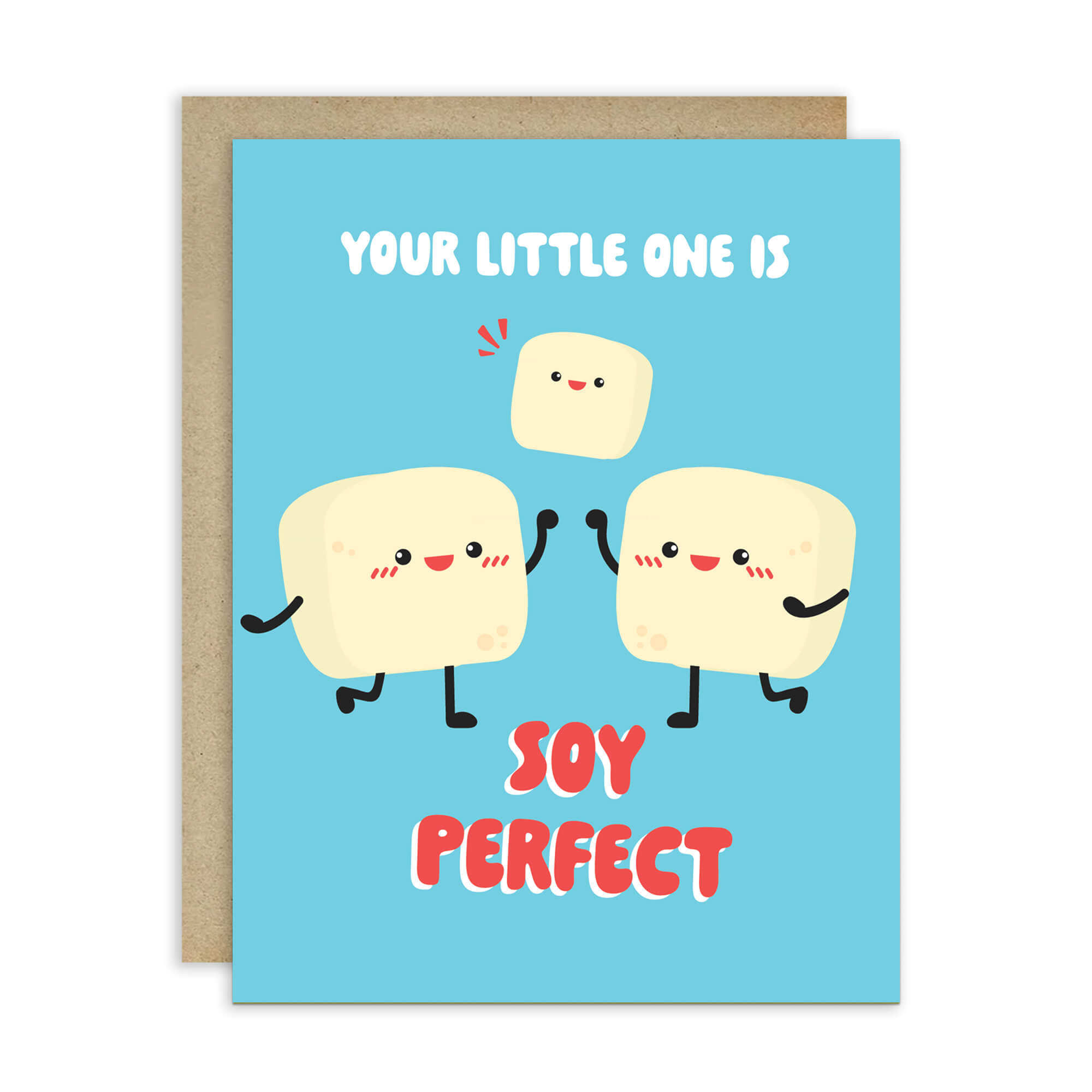 A funny baby shower card with a light blue front and a kraft envelope behind it. The card features a cute cartoon illustration of three smiling tofus holding hands, with the text 'YOUR LITTLE ONE IS' above and 'SOY PERFECT' below in red and white lettering.