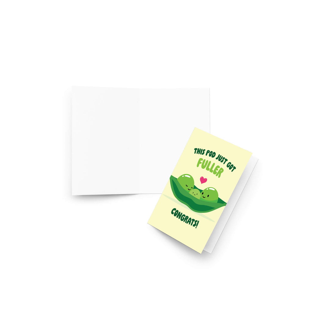 A folded baby shower card with a pale yellow front and a white back, featuring a cute green pod illustration and the text 'THIS POD, NOT GOT FULLER CONGRATS!'. The card is shown standing slightly open on a clean white background.