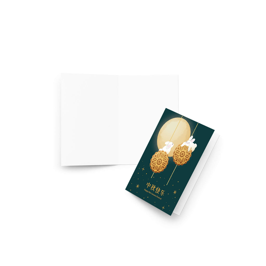 asian Greeting card with rabbits and moon design on a dark green background, featuring 'Happy Mid-Autumn Festival' text.