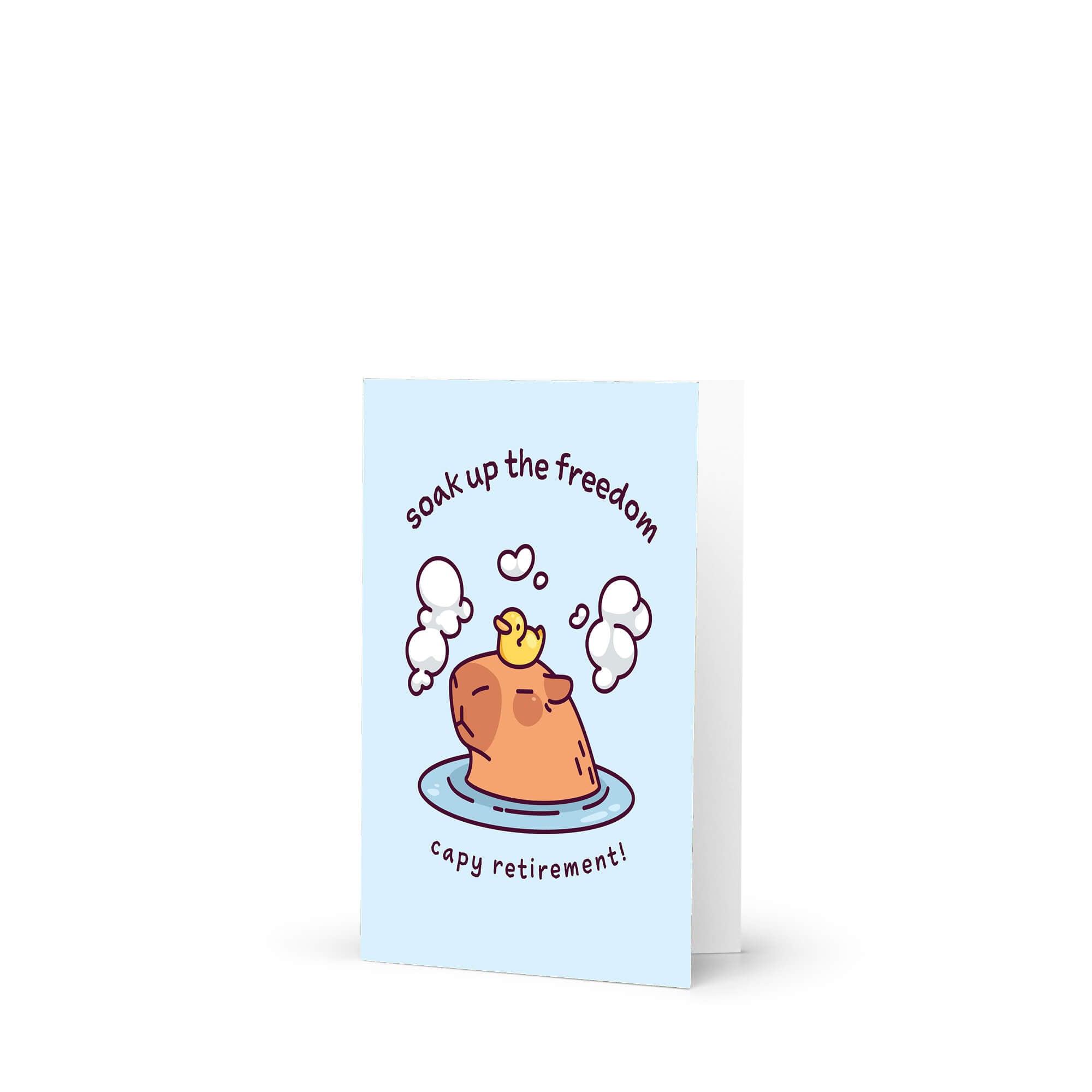 Greeting card with a cartoon character in a bathtub and text 'soak up the freedom capy retirement!' on a light blue background.