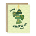 Greeting card with green banana leaf zong zi chinese tamale illustrations and text on a light green background
