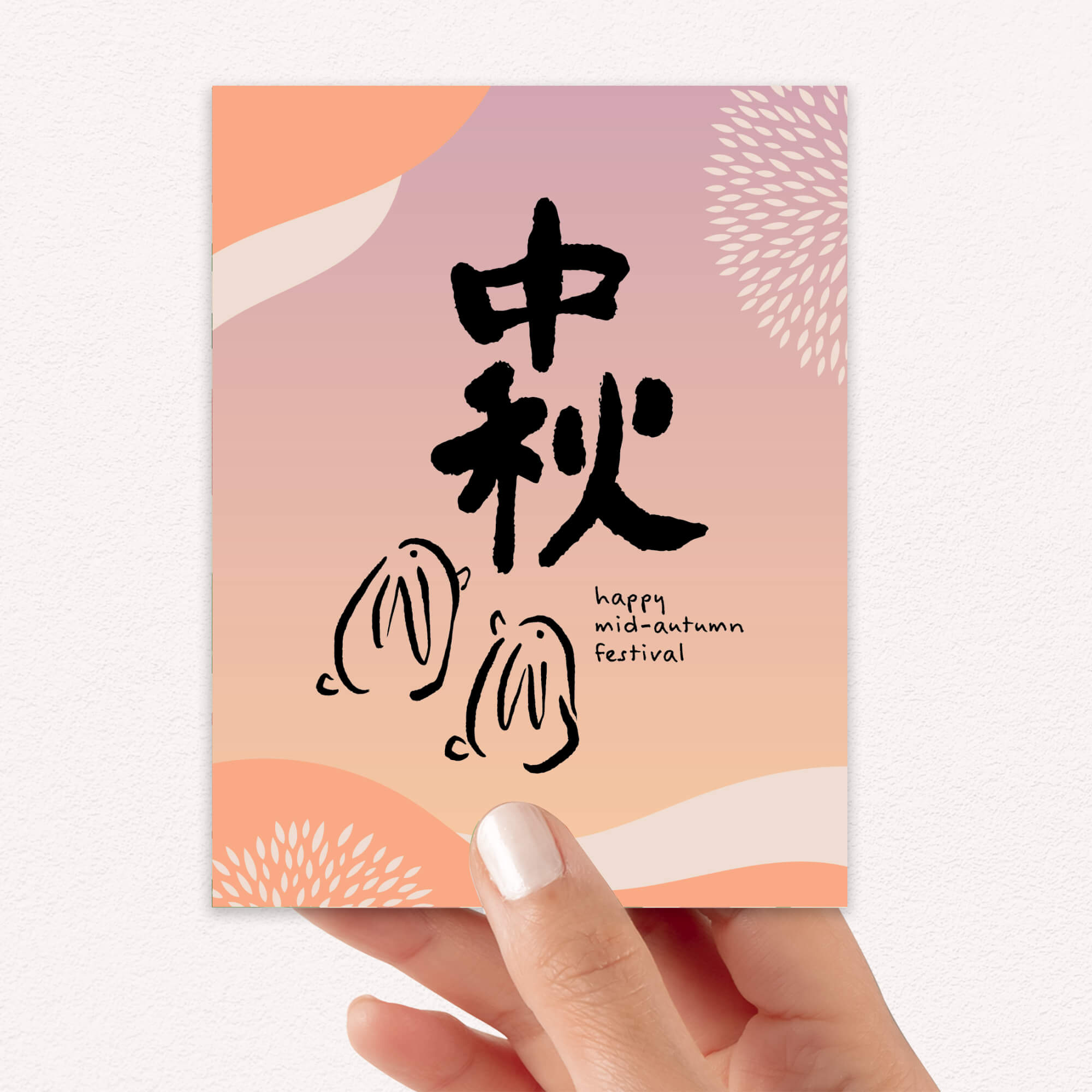chinese inspired greeting Card with black calligraphy and 'happy mid-autumn festival' text on a pink and orange gradient background.
