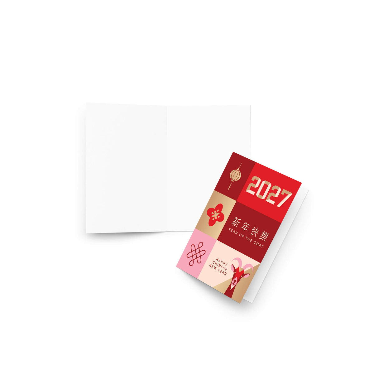 A folded year of the goat card with a red, pink, and beige Chinese New Year design, shown next to an open blank white envelope on a clean white background.