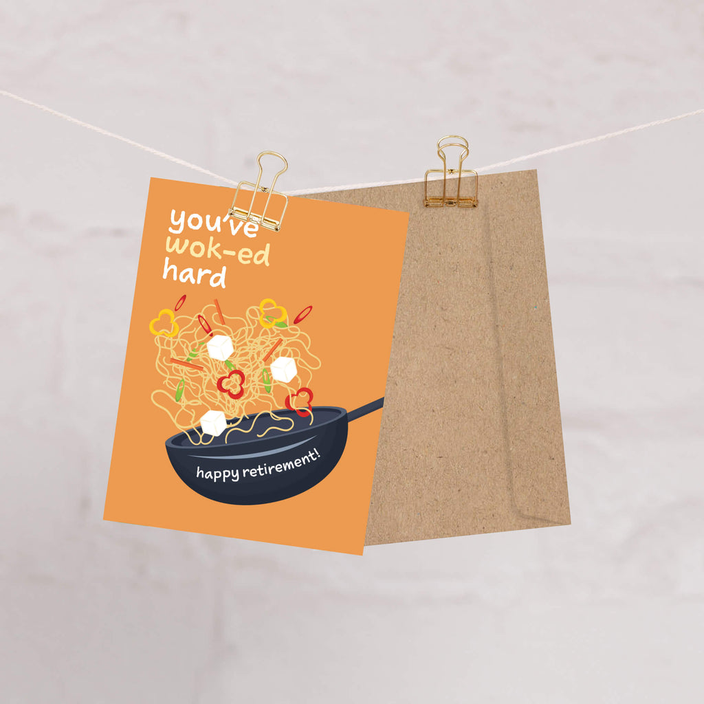 retirement card with a wok and noodles design, text 'you've wok-ed hard happy retirement!', on an orange background.