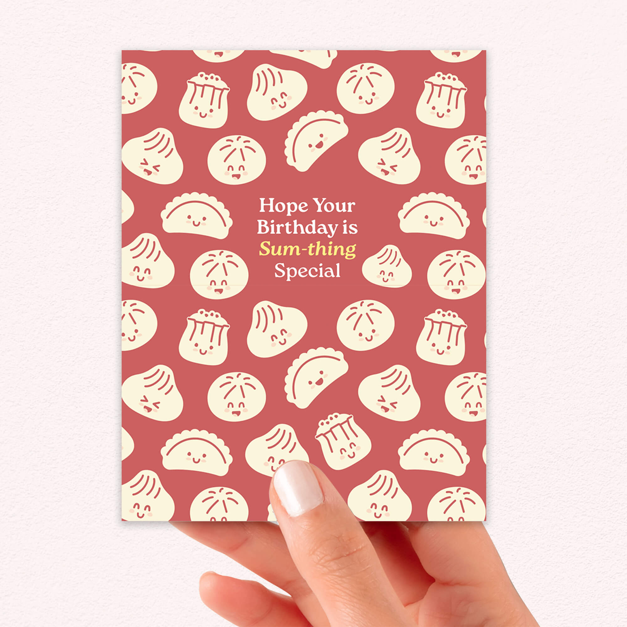 Greeting card with dumpling pattern and birthday message on a red background