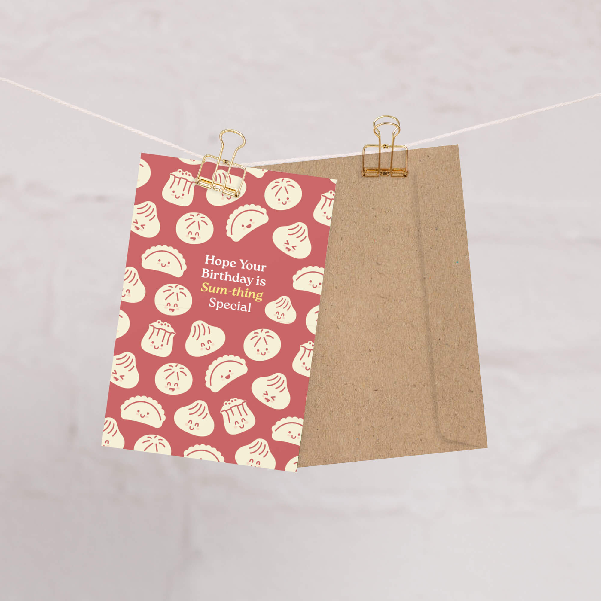 Greeting card with dumpling pattern and text on a beige background