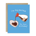 Greeting card with a bottle pouring chocolate into a heart shape, text 'I'm so excited for your birthday!' on a blue background.
