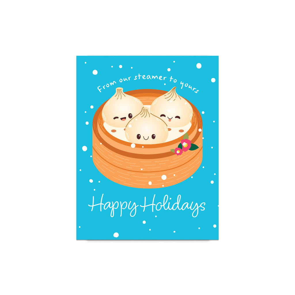cute christmas greeting card with Three cute soup dumplings in bamboo steamer on teal snow with “From our steamer to yours. Happy Holidays.”