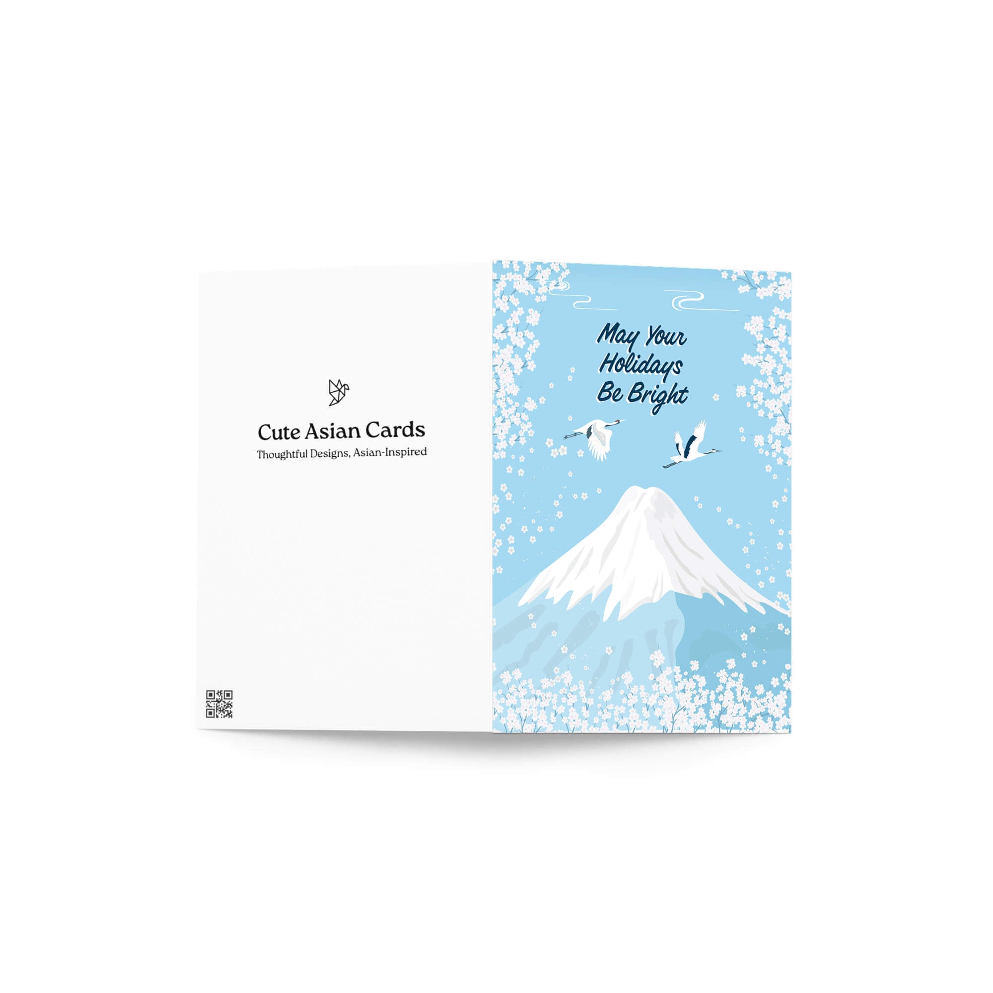 japanese christmas card with a winter snowy Mount Fuji with cranes and white cherry blossoms; text “May Your Holidays Be Bright.”
