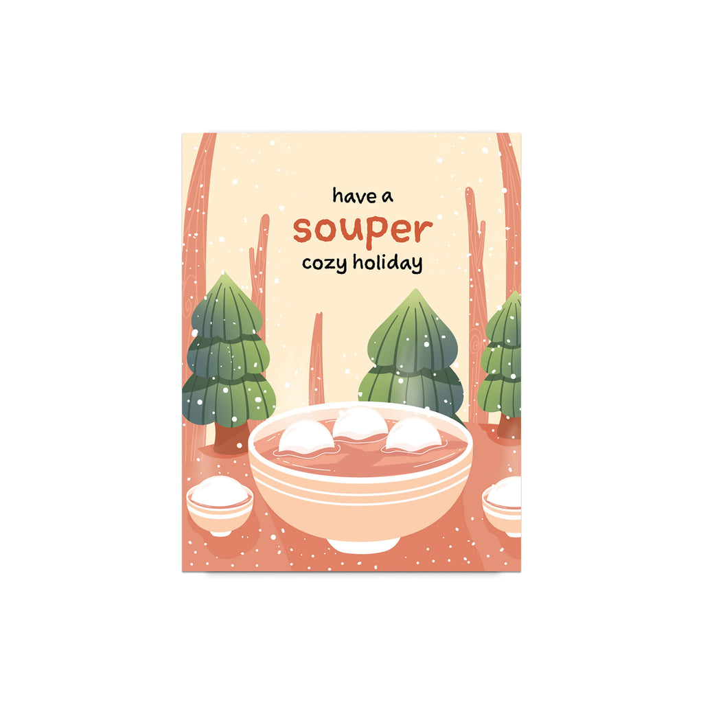 unique holiday Greeting card with a bowl of soup and winter scene, text 'have a souper cozy holiday'. 
