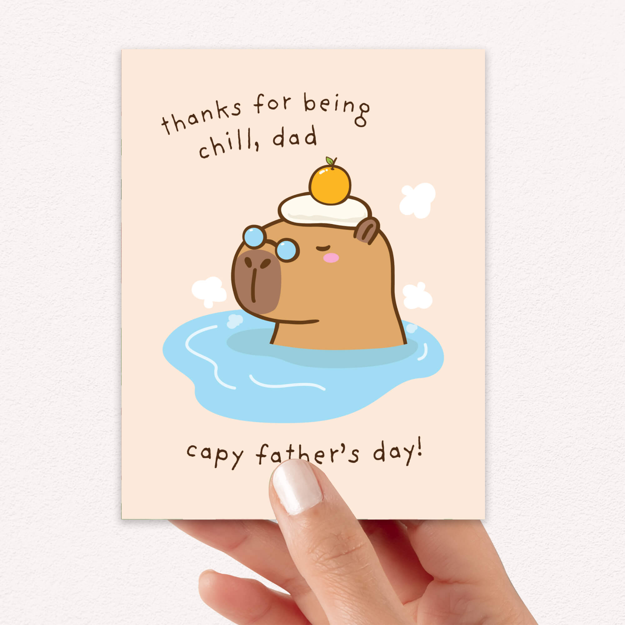 funny Father's Day card with a cute capybara animal in water and text 'thanks for being chill, dad capy father's day!' on a beige background.