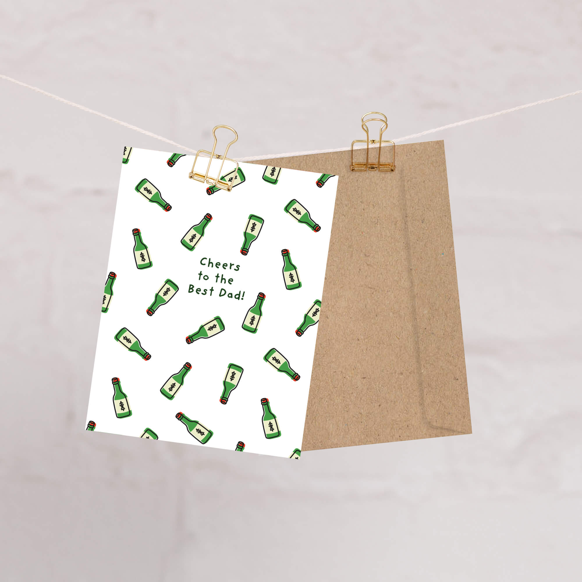 Greeting card with green korean soju alcohol bottle illustrations and 'Cheers to the Best Dad!' text.