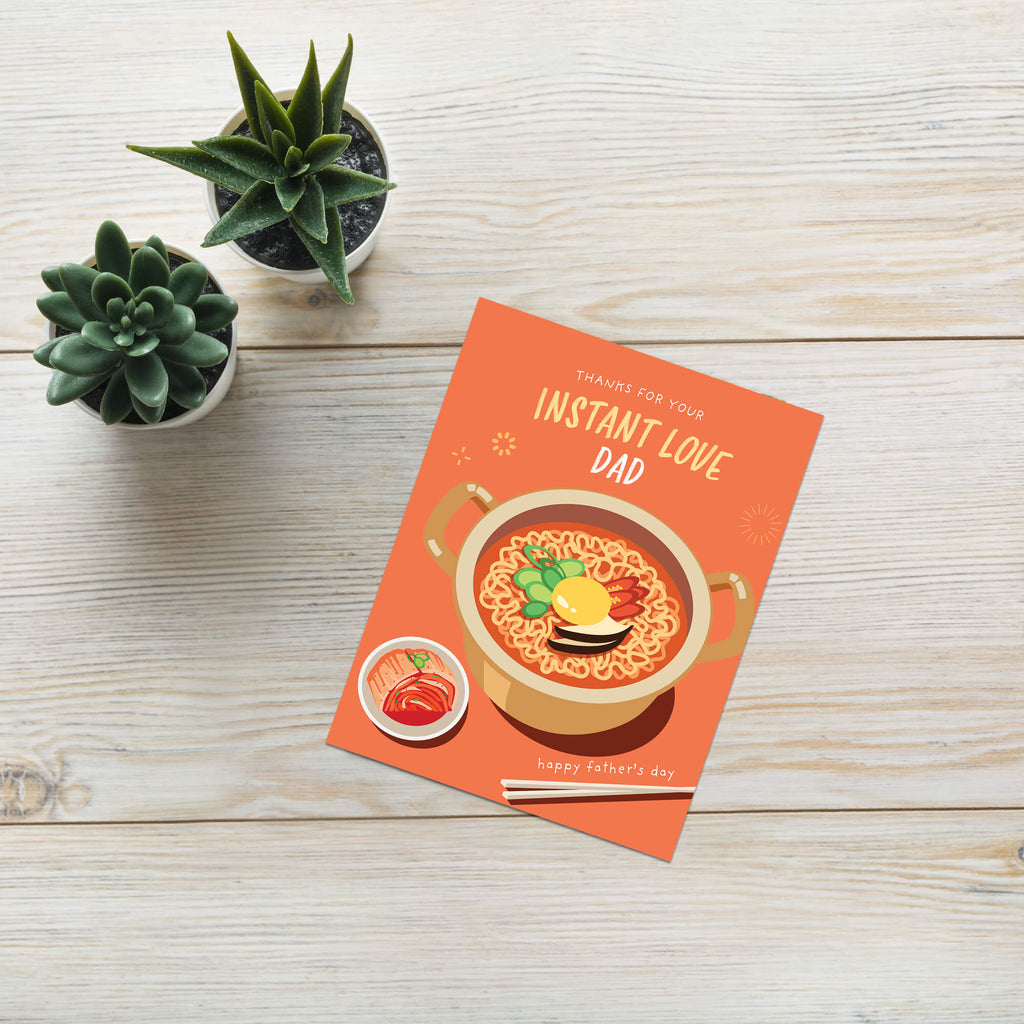 funny father's day card with a pot of korean instant noodles and text 'Thanks for your instant love dad' on an orange background.