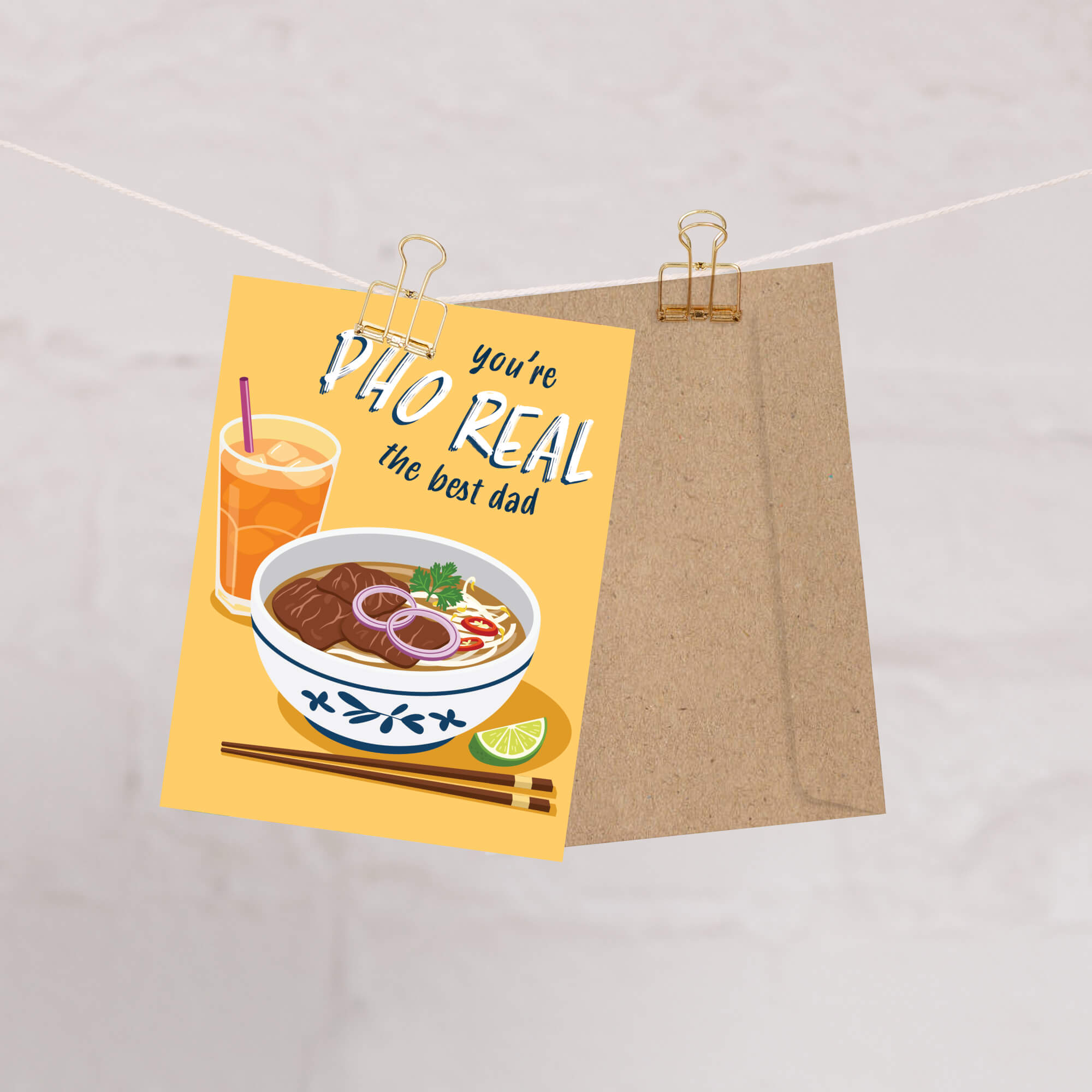 unique fathers day card with a bowl of pho, glass of iced tea, and text 'you're PHO REAL the best dad' on a yellow background.