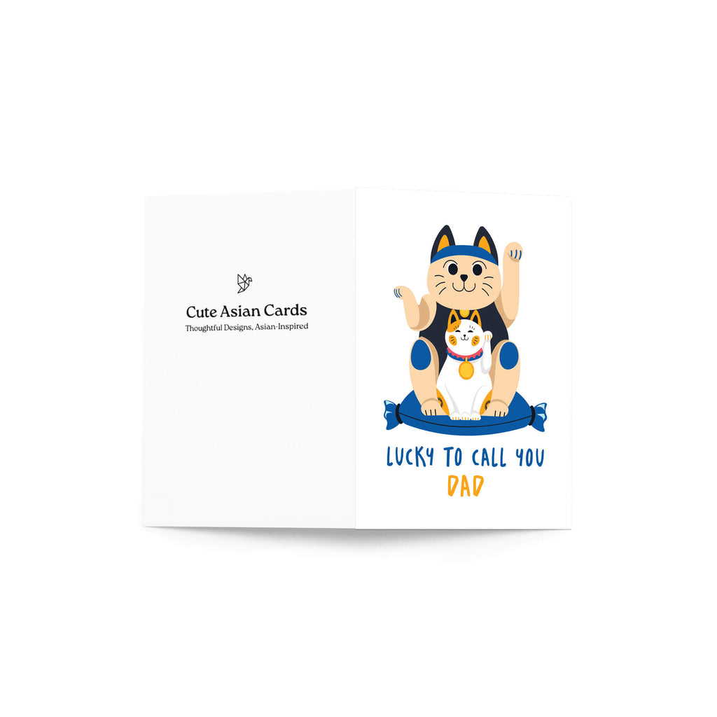 cute father's day card with japanese maneki neko lucky cat design and text 'Lucky to call you Dad' on a white background.