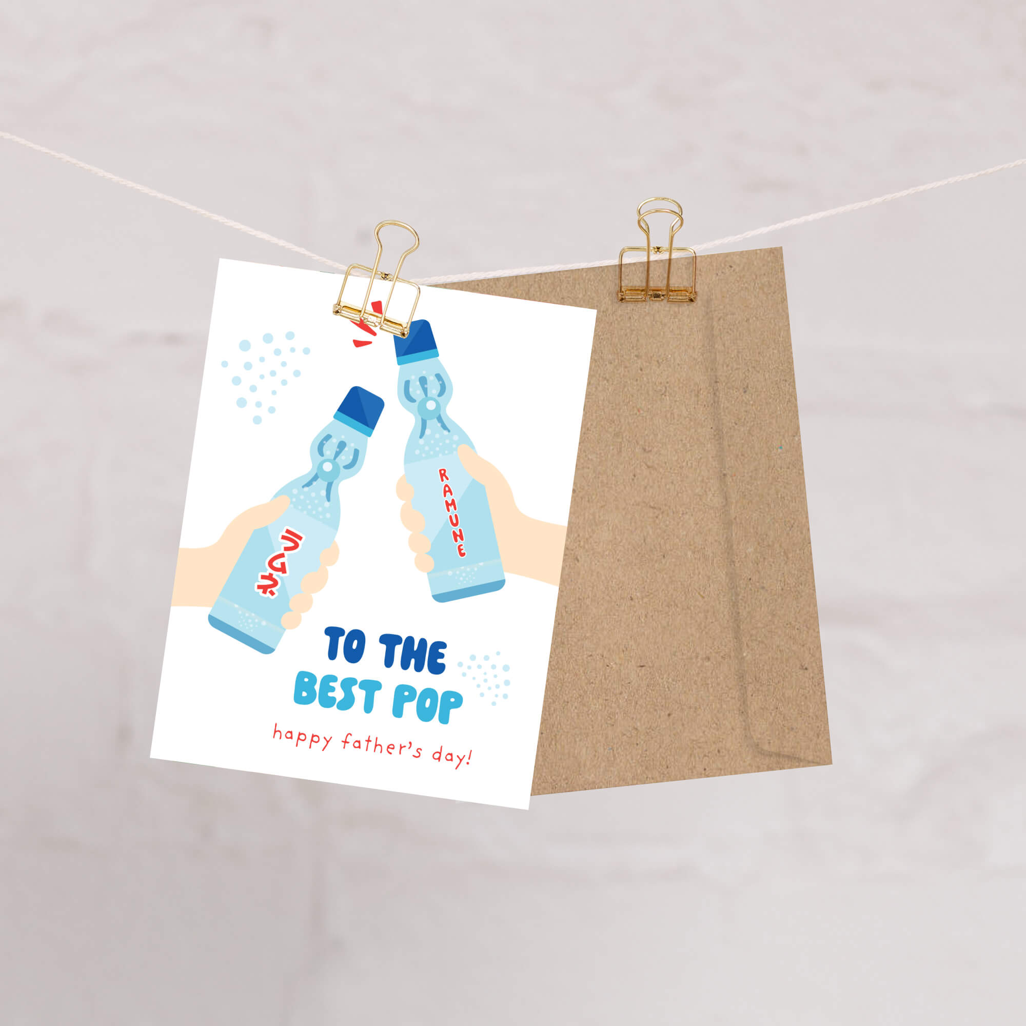 funny Father's Day card with two hands holding japanese soda pop bottles and pun 'To the best pop happy father's day!'.
