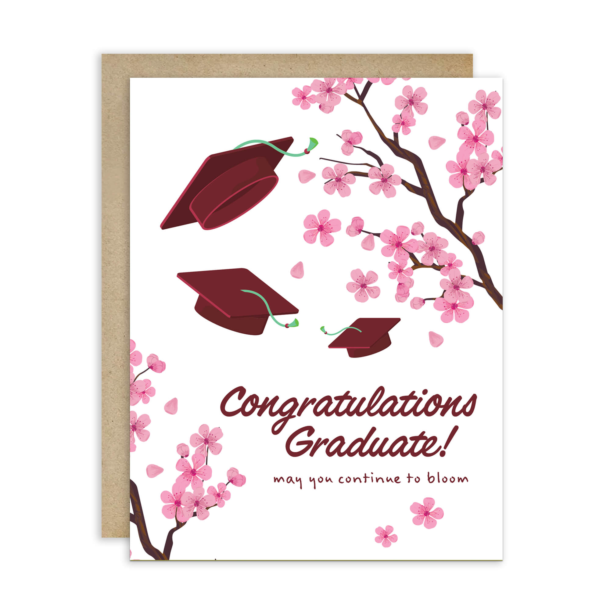 Graduation card with japanese cherry blossoms and red graduation caps on a white background
