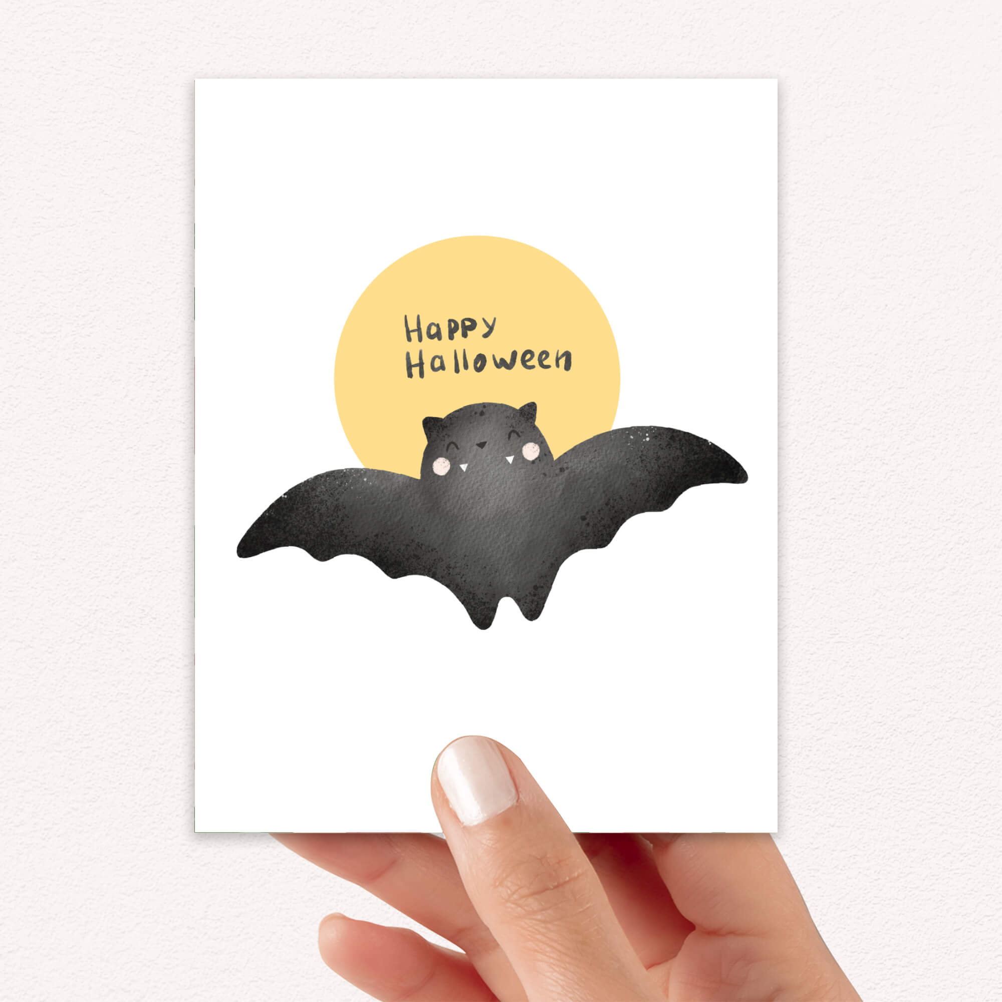 cute Halloween card with a bat and 'Happy Halloween' text on a yellow moon