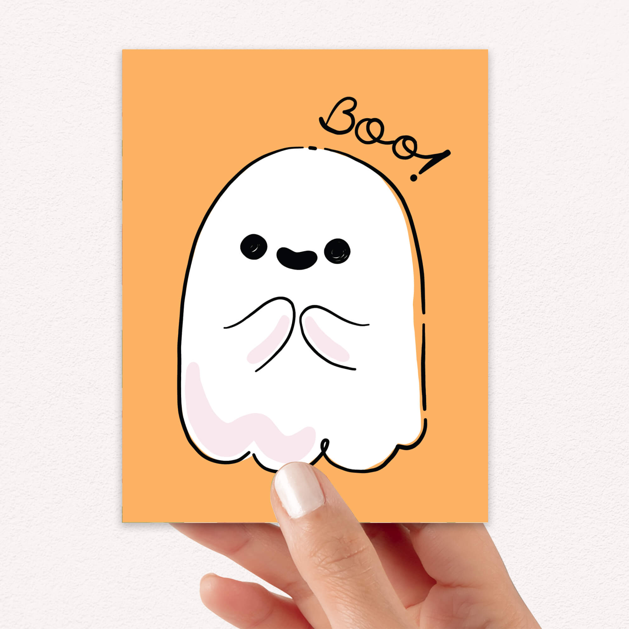 Halloween-themed card with a cute ghost illustration and 'Boo!' text on an orange background.