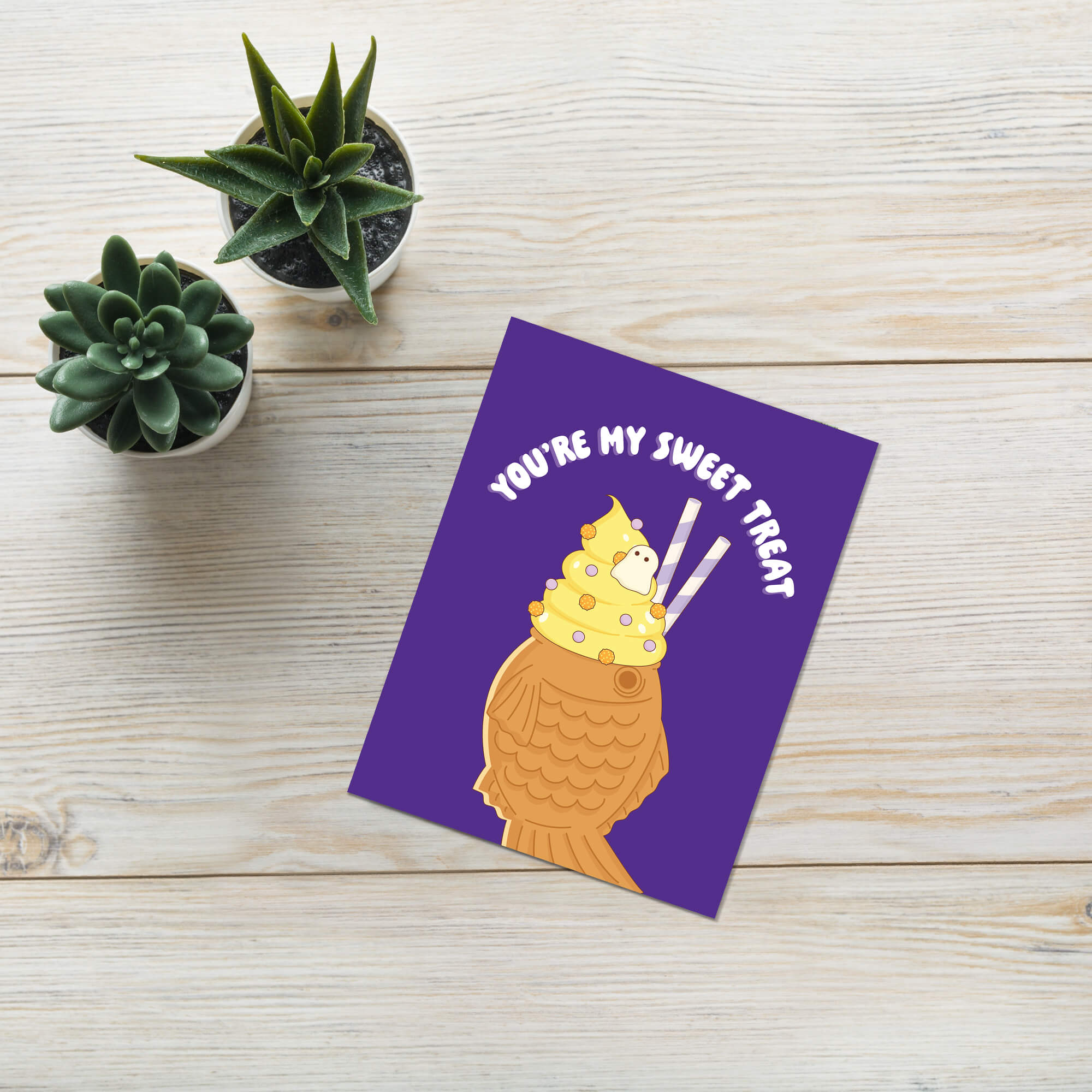 kawaii cute halloween Greeting card with ice cream taiyaki illustration and 'You're my sweet treat' text on a purple card
