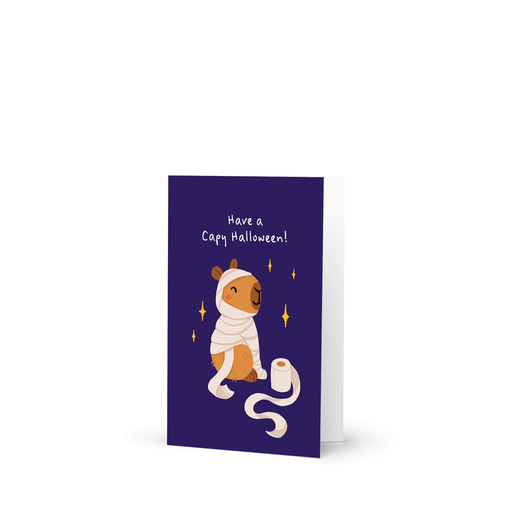 Greeting card with a cartoon bear in a cape and mask, text 'Have a Capy Halloween!', on a white background.