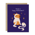 Halloween card with a cartoon capybara in a mummy costume on a dark blue background.