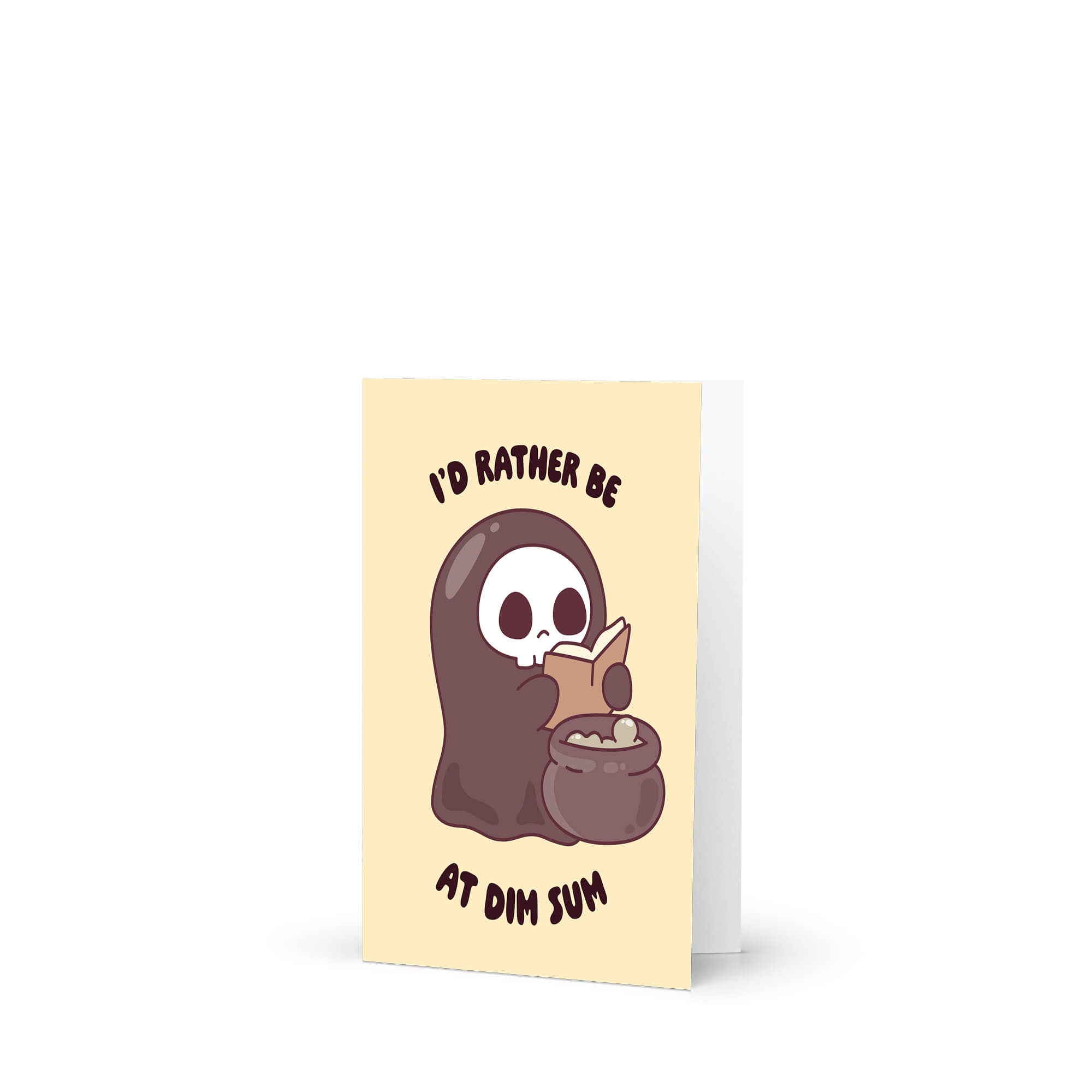 funny halloween Greeting card with a kawaii grim reaper holding a cauldron and text 'I'd rather be at dim sum' on a beige background.