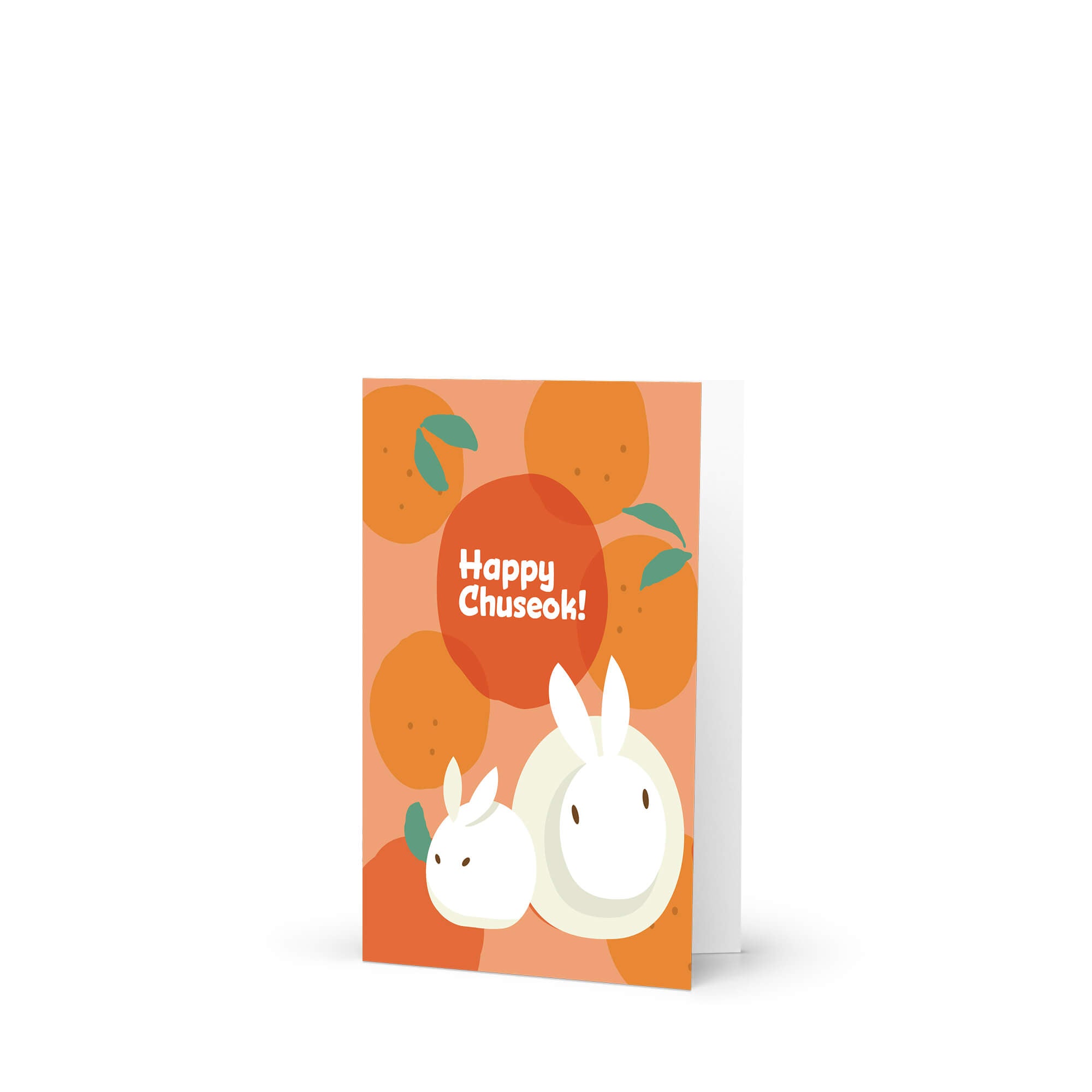 korean inspired Greeting card with rabbits designed as songpyeon and oranges on an orange background, featuring 'Happy Chuseok!' text.