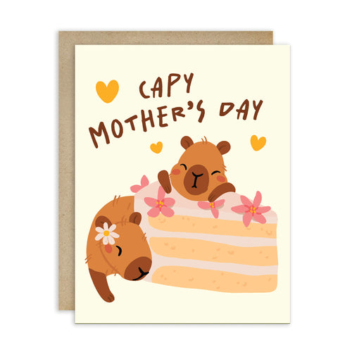 Mother's Day card with cute capybara animals around a cake light on a light yellow background with funny pun message: capy mother's day surrounded by hearts