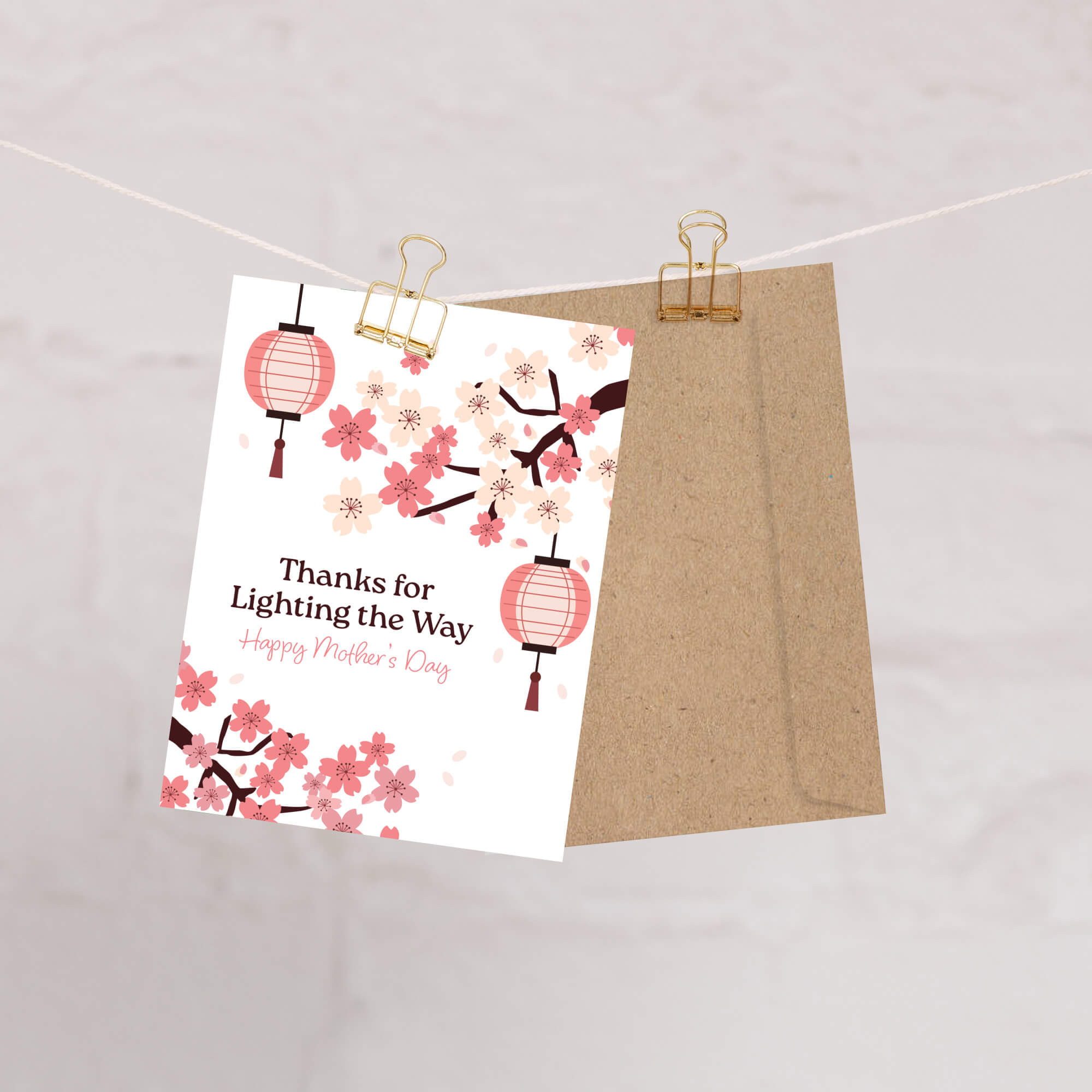 asian greeting card for mother's day with pink cherry blossom flowers and lanterns on a white background and text: thanks for lighting the way