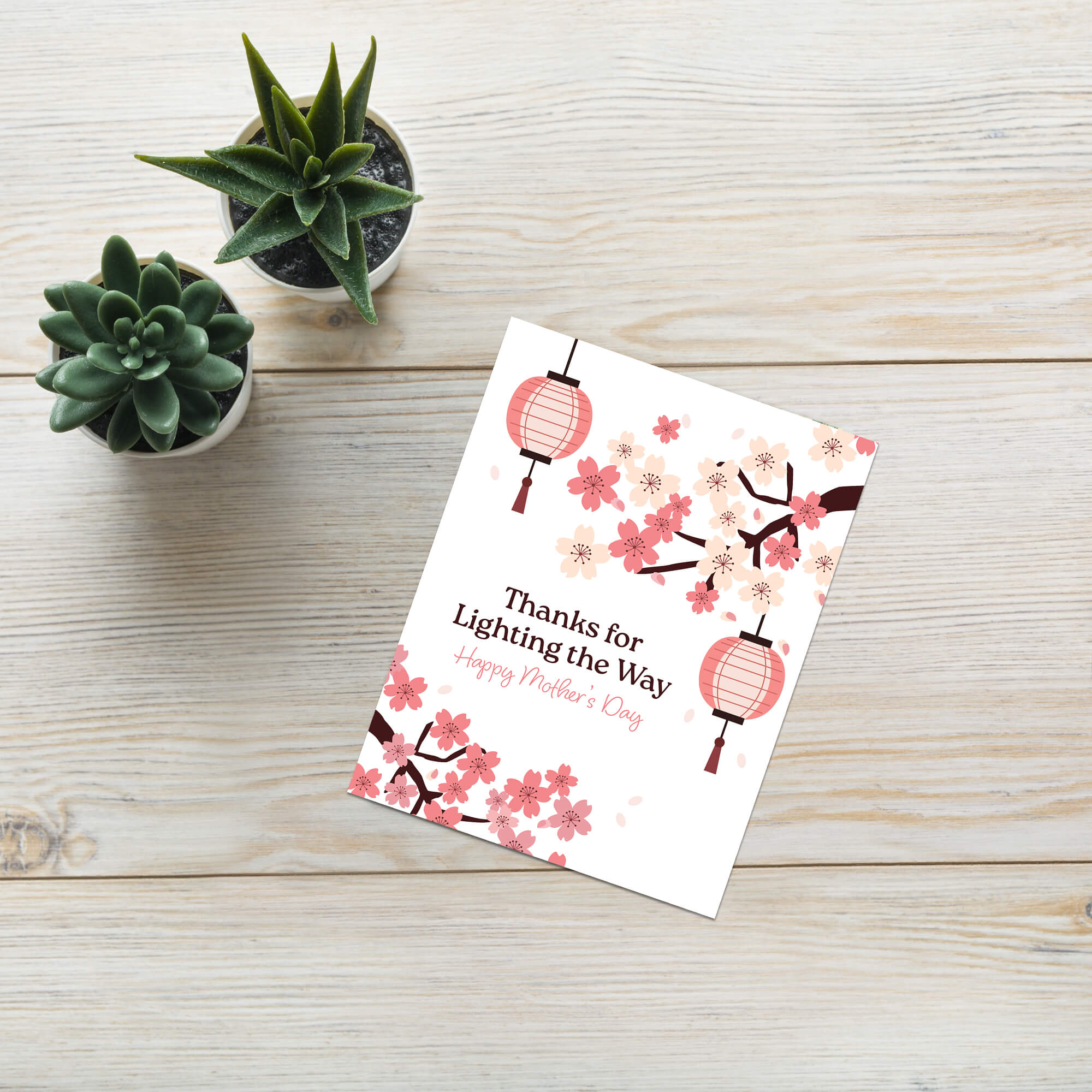 asian greeting card for mother's day with pink cherry blossom flowers and lanterns on a white background and text: thanks for lighting the way