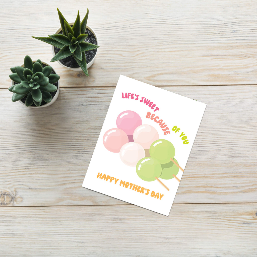asian Greeting card with japanese dango rice ball dessert food and 'Happy Mother's Day' text on a white background