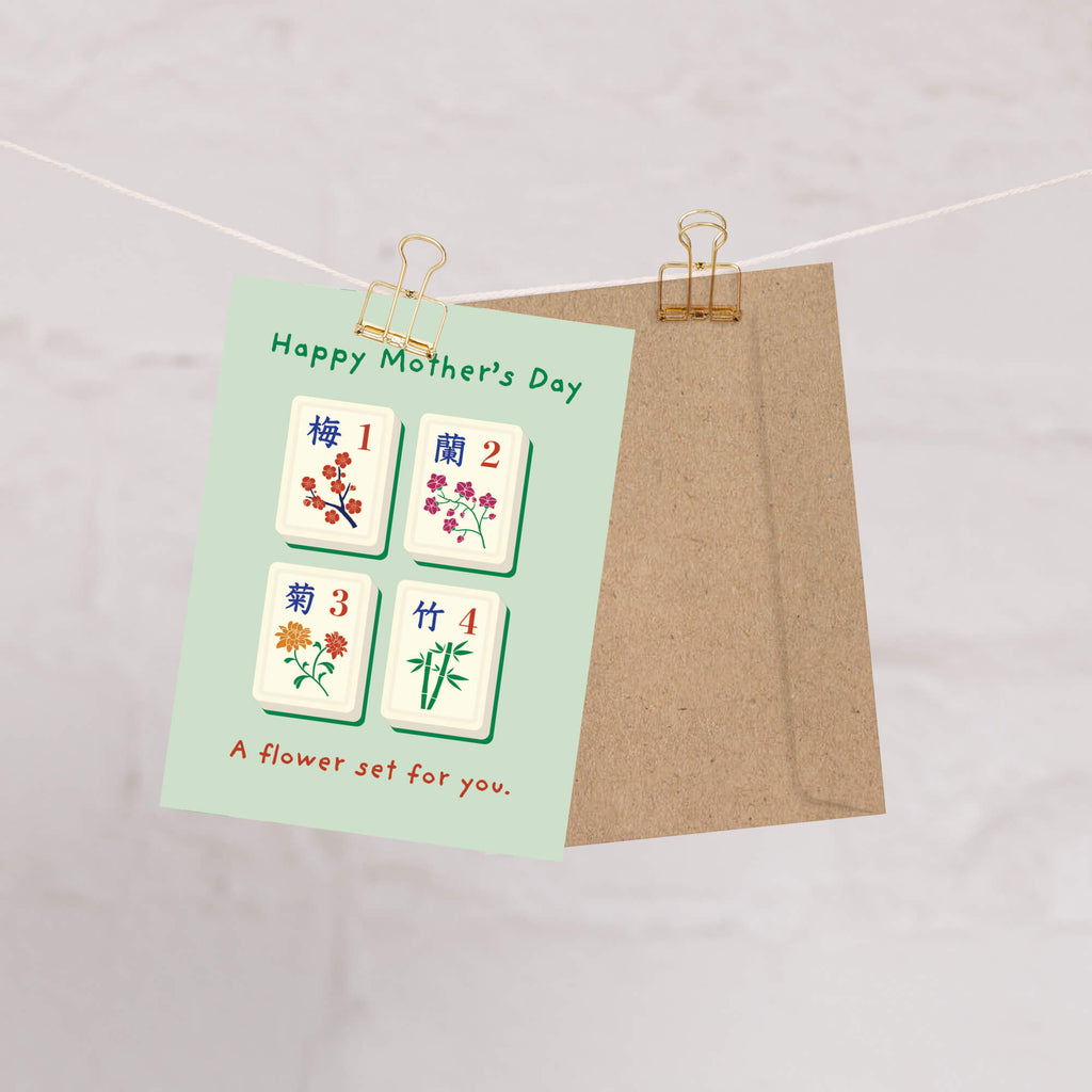 happy Mother's Day card with Mahjong tiles and floral designs on a light green background