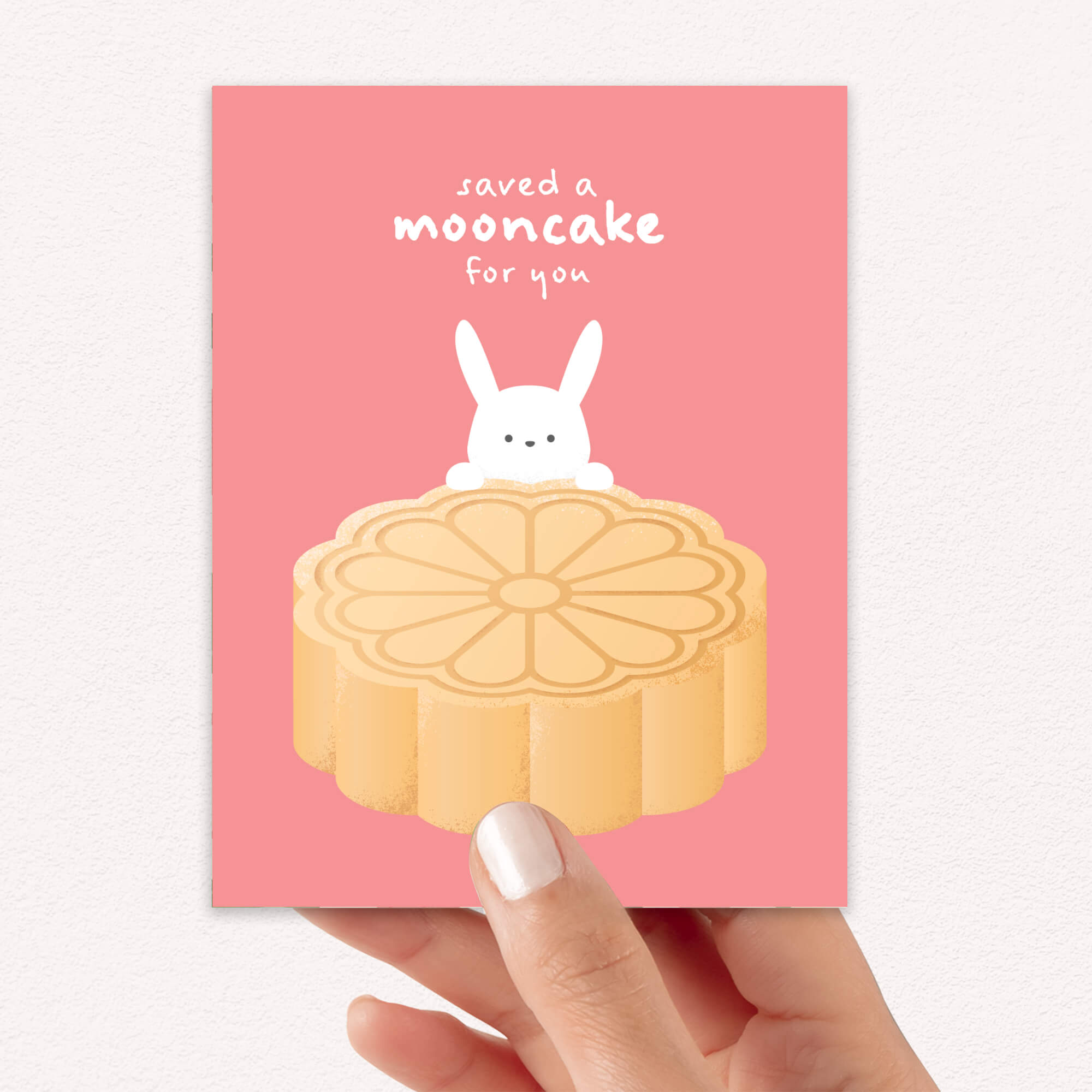 chinese greeting Card with a mooncake and rabbit illustration on a pink background, featuring the brand 'Cute Asian Cards' for mid autumn festival