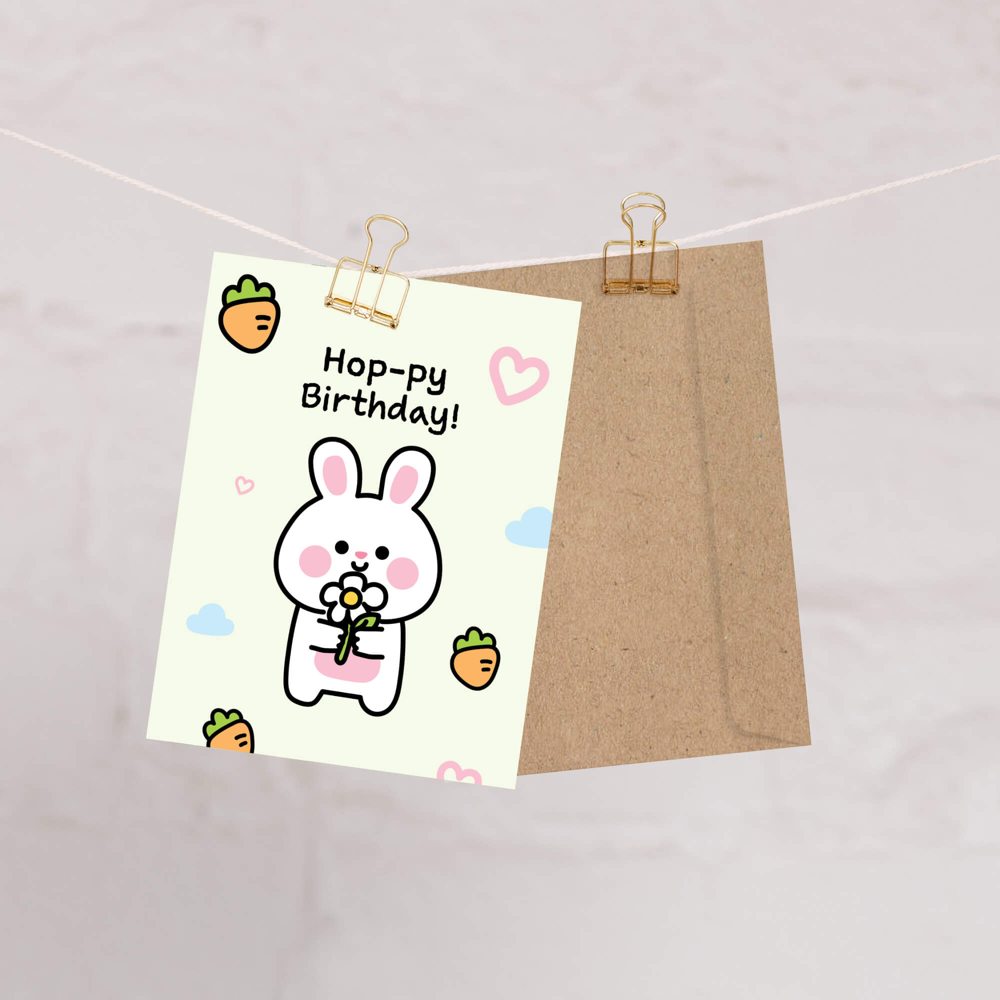 Cartoon rabbit birthday card with 'Hoppy Birthday!' text on a white background.