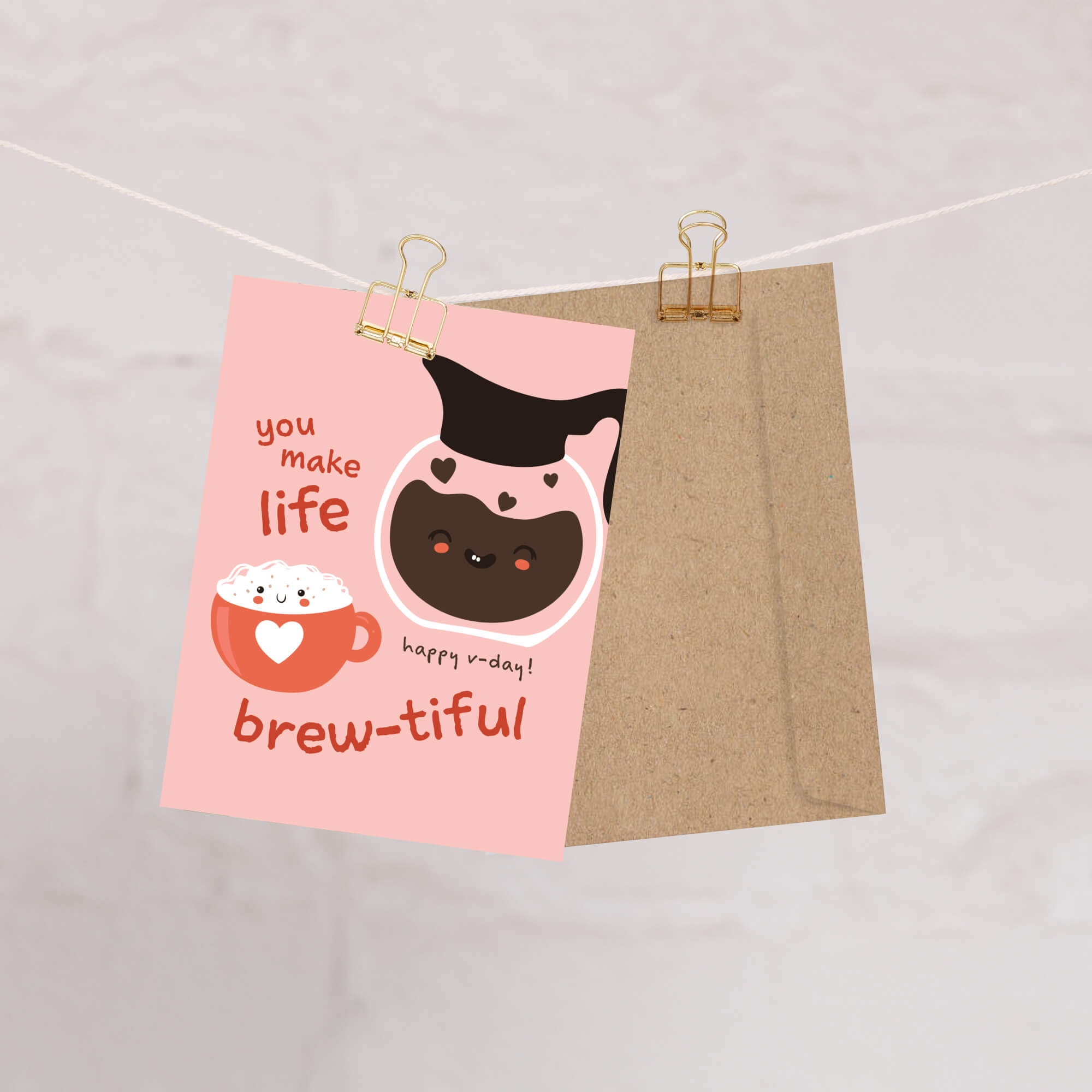 cute valentines day card with a Smiling coffee carafe and heart latte mug on blush pink; text “You make life brew-tiful.”