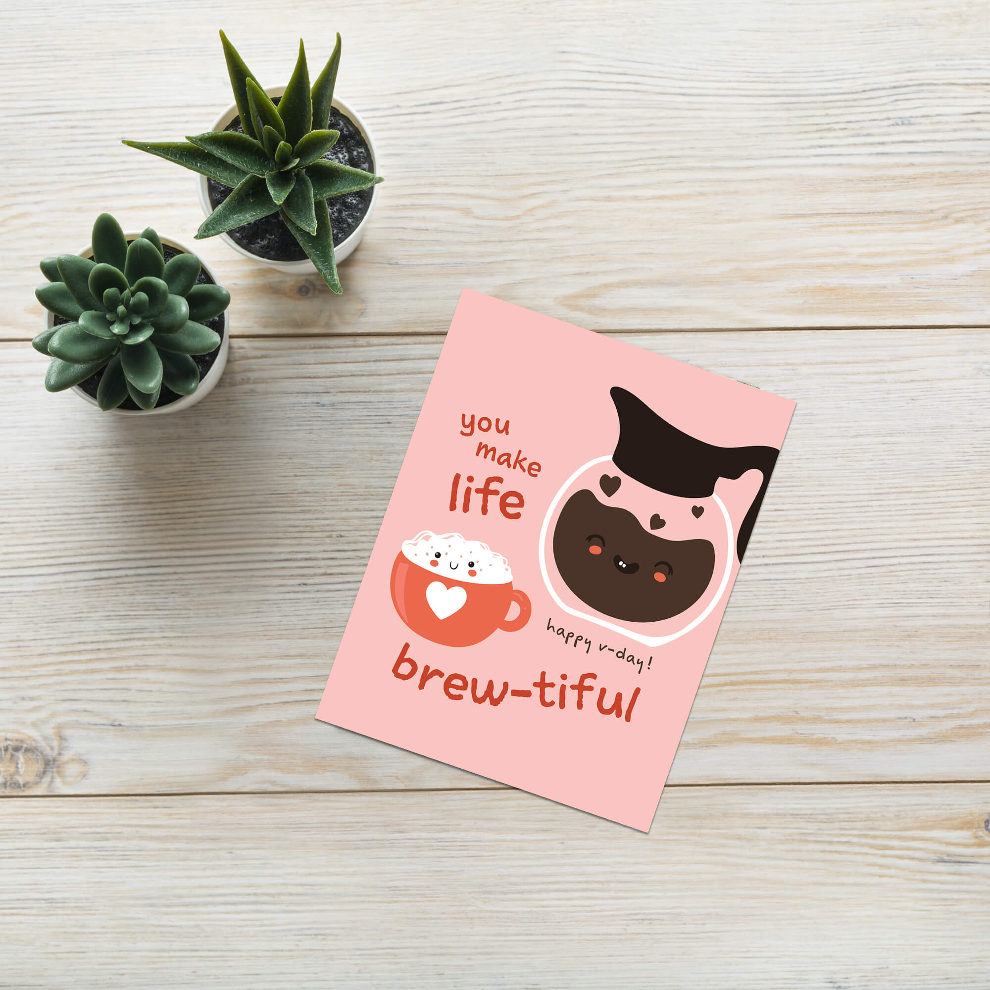cute valentines day card with a Smiling coffee carafe and heart latte mug on blush pink; text “You make life brew-tiful.”
