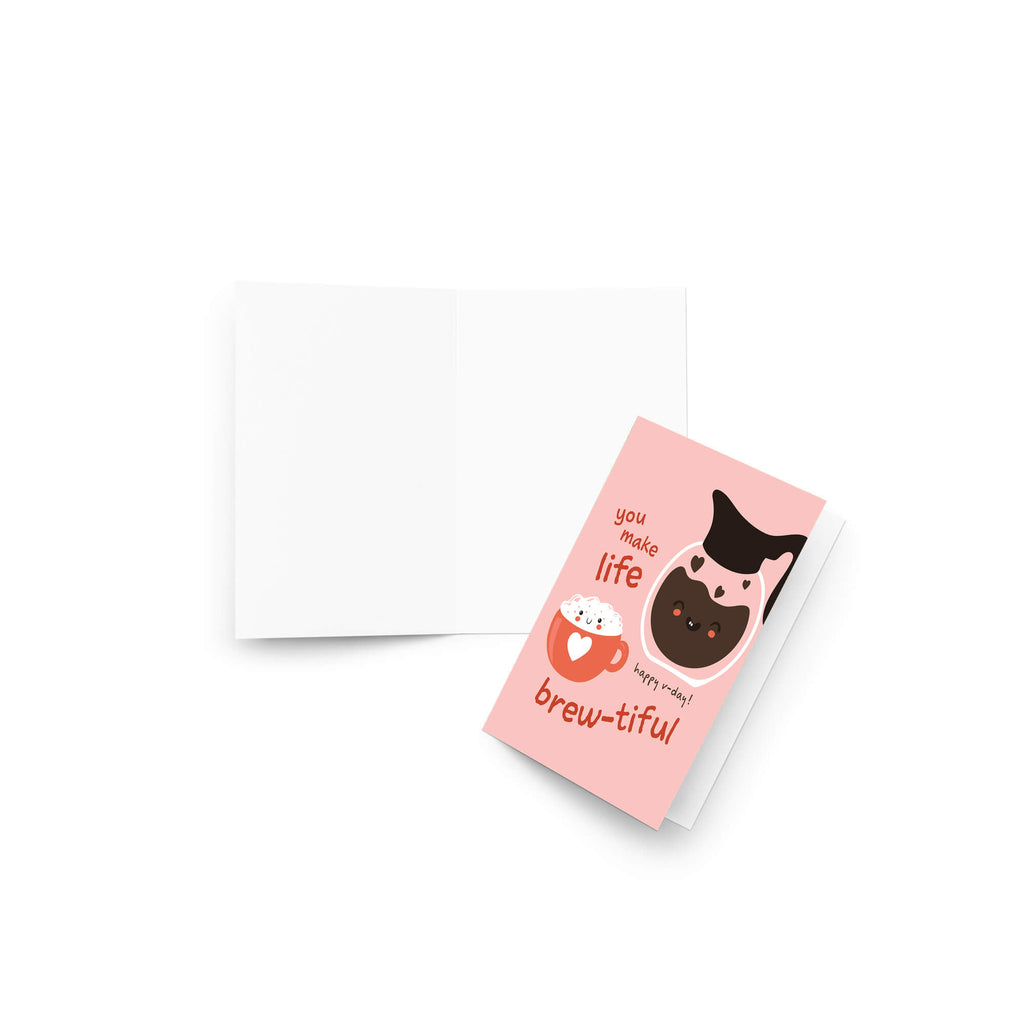 cute valentines day card with a Smiling coffee carafe and heart latte mug on blush pink; text “You make life brew-tiful.”