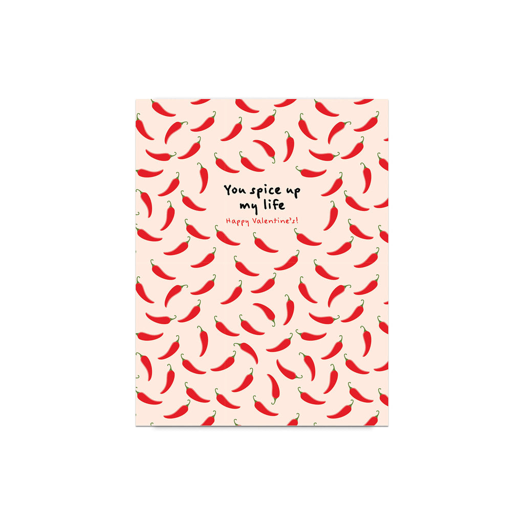 light pink valentines day card with repeating red chilies and center text “You spice up my life — Happy Valentine’s.”