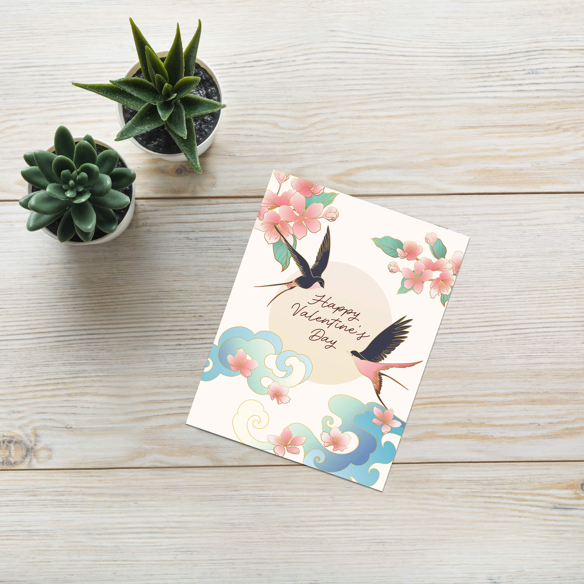 Two swallows flying near blossoms and pale sun with “Happy Valentine’s Day.”