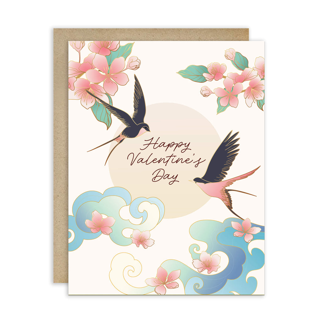Two swallows flying near blossoms and pale sun with “Happy Valentine’s Day.”