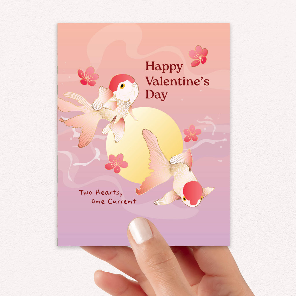 Two koi fish circling a moon with blossoms and text “Happy Valentine’s Day — Two Hearts, One Current.”