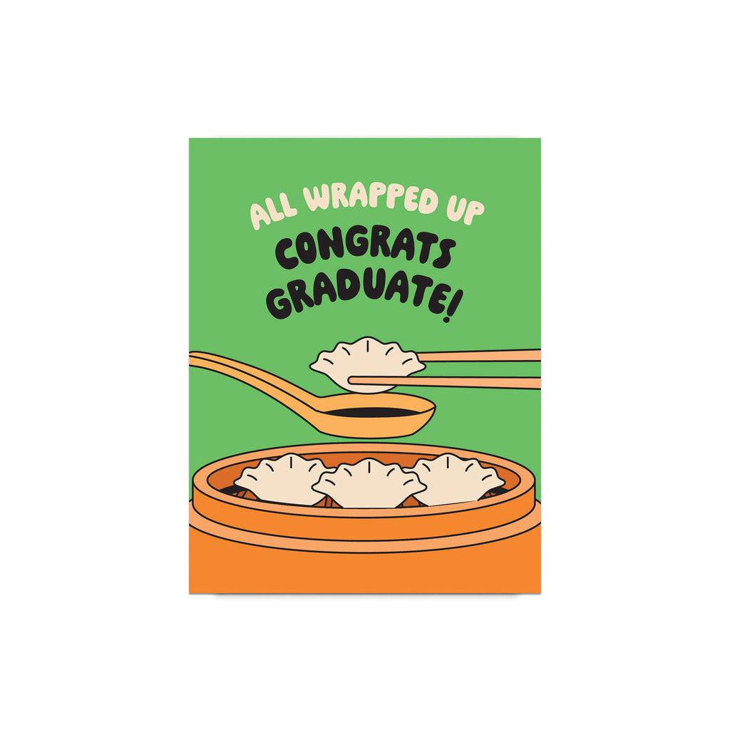 Graduation card with dumplings and text 'All Wrapped Up Congrats Graduate!' on a green background.